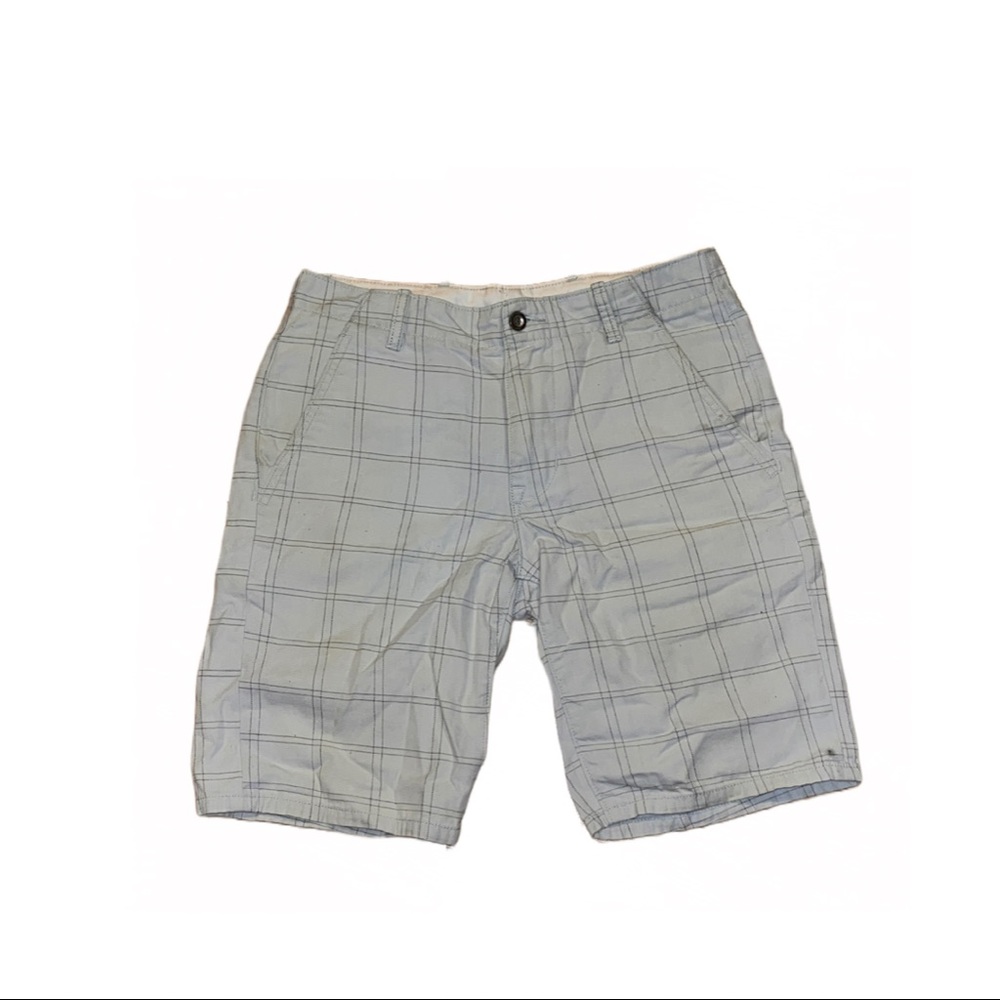 Off-white 30W Levi’s shorts.
